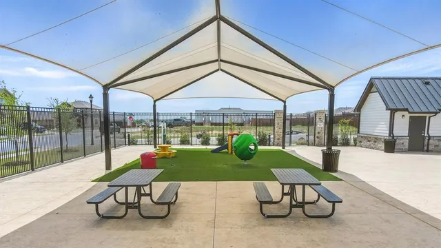a building outdoor space with furniture and garden view