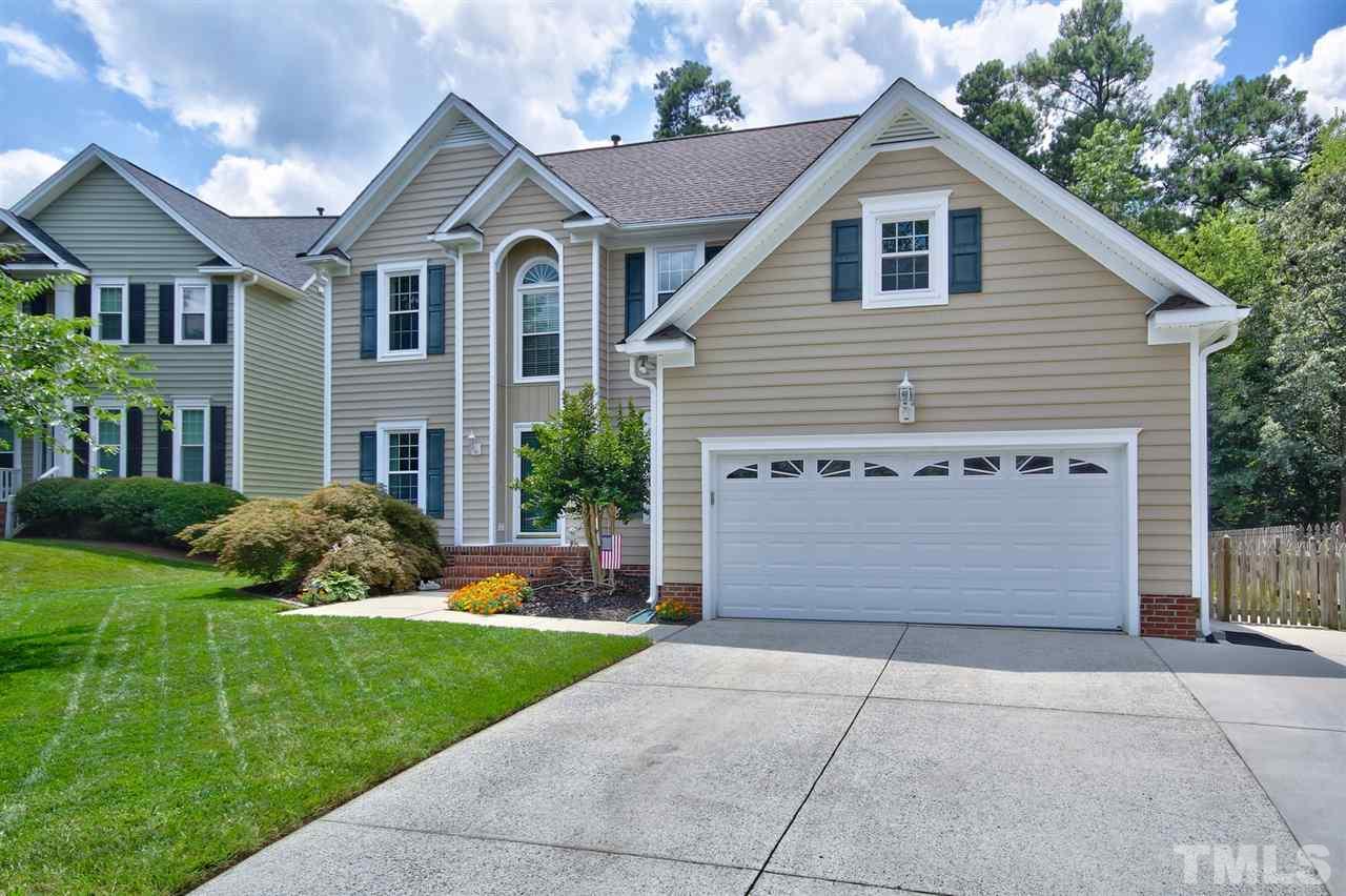 12305 Amoretto Way Raleigh, NC 27613 - Photo 2 of 30 Lush lawn and meticulously maintained. Fenced in backyard is private and extended garage for additional storage.