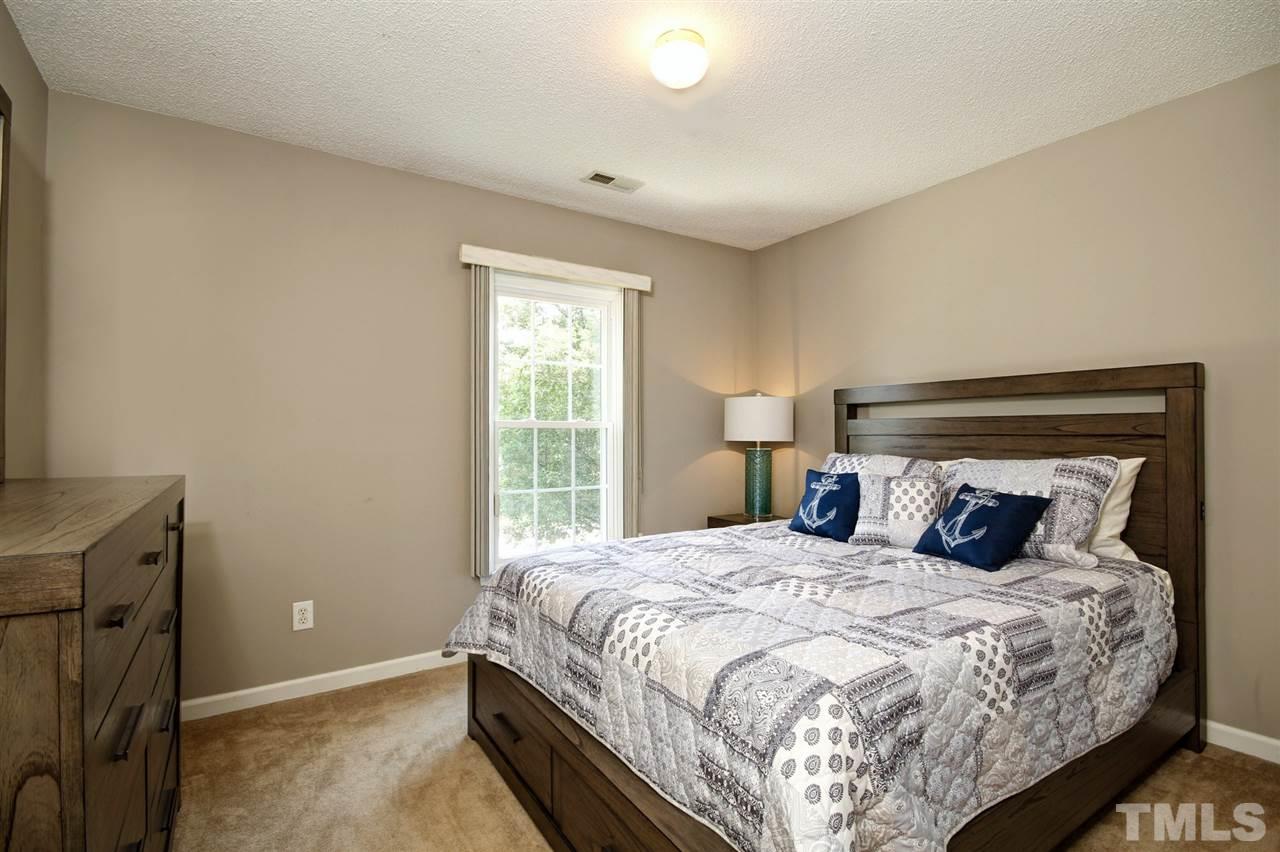 12305 Amoretto Way Raleigh, NC 27613 - Photo 20 of 30 All of the bedrooms have large closets and fresh paint throughout the home.