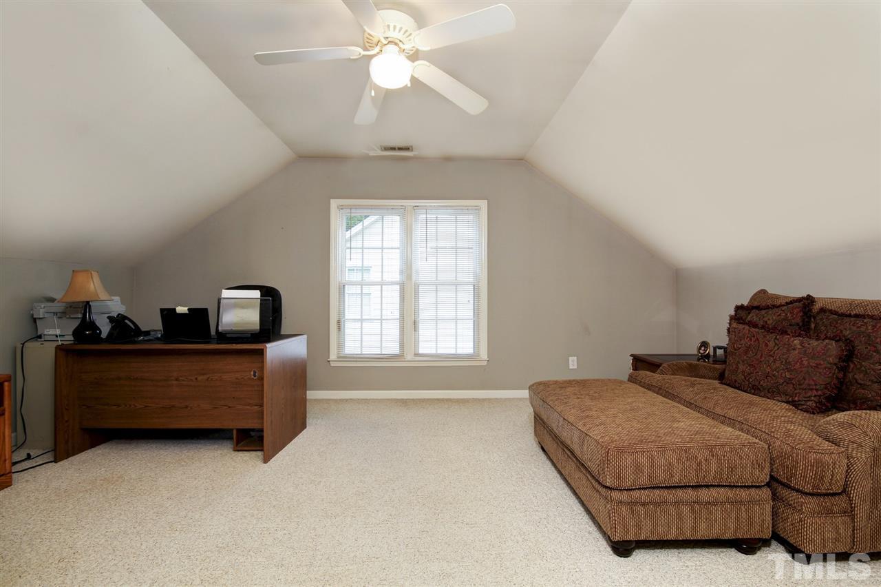 12305 Amoretto Way Raleigh, NC 27613 - Photo 24 of 30 Very large 4th bedroom could be used as a bonus room, man cave, crafts room or game room. Host a movie night and have your friends and family over!