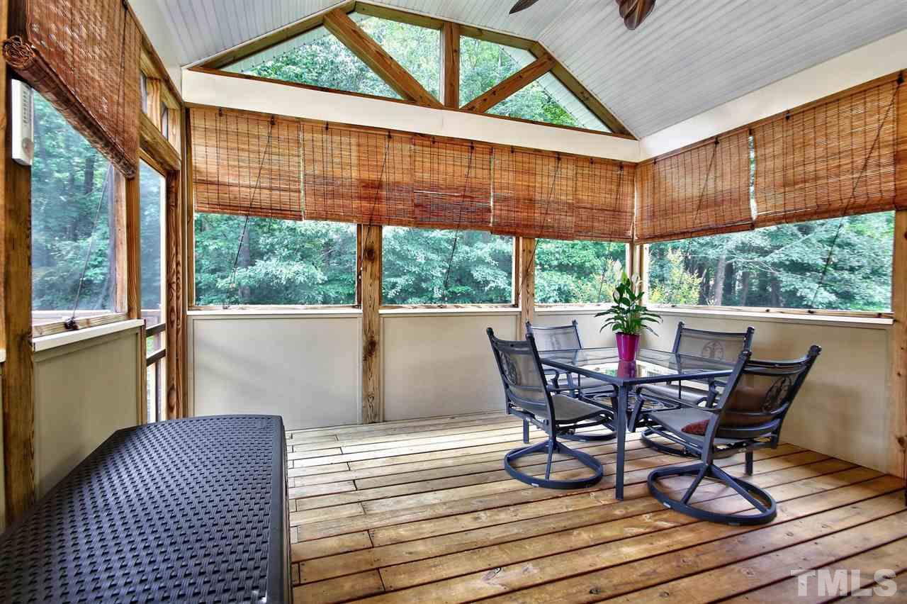 12305 Amoretto Way Raleigh, NC 27613 - Photo 26 of 30 Lovely screened in porch to drink your morning coffee or have a cold beverage in.
