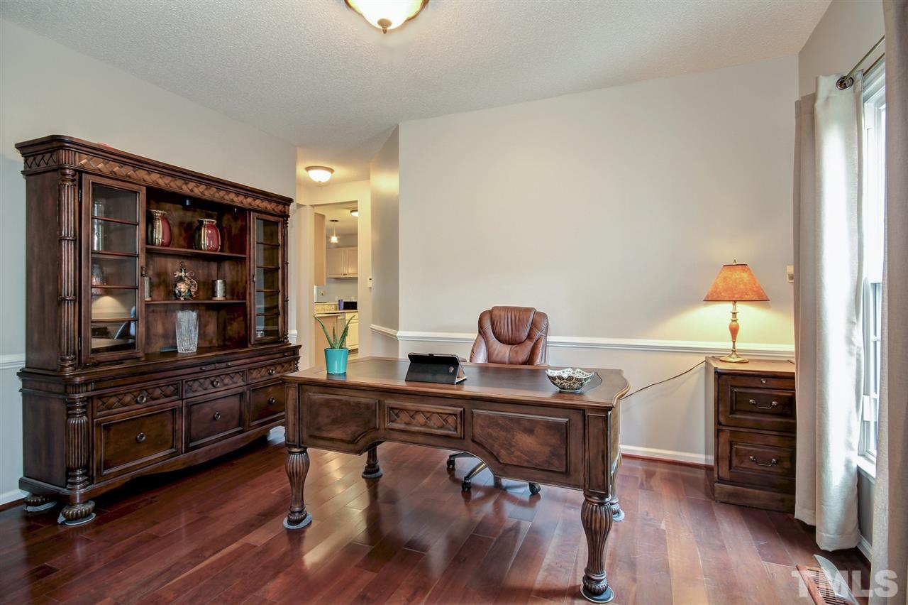 12305 Amoretto Way Raleigh, NC 27613 - Photo 4 of 30 Currently used as an office, the versatility of this gorgeous room with the stunning Brazilian Cherry floors allows for tons of natural lighting.
