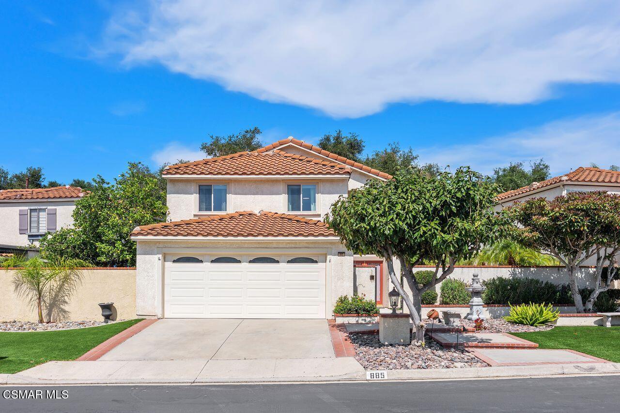 885 Congressional Road Simi Valley, CA 93065 - Photo 1 of 44 a front view of a house with a yard and garage