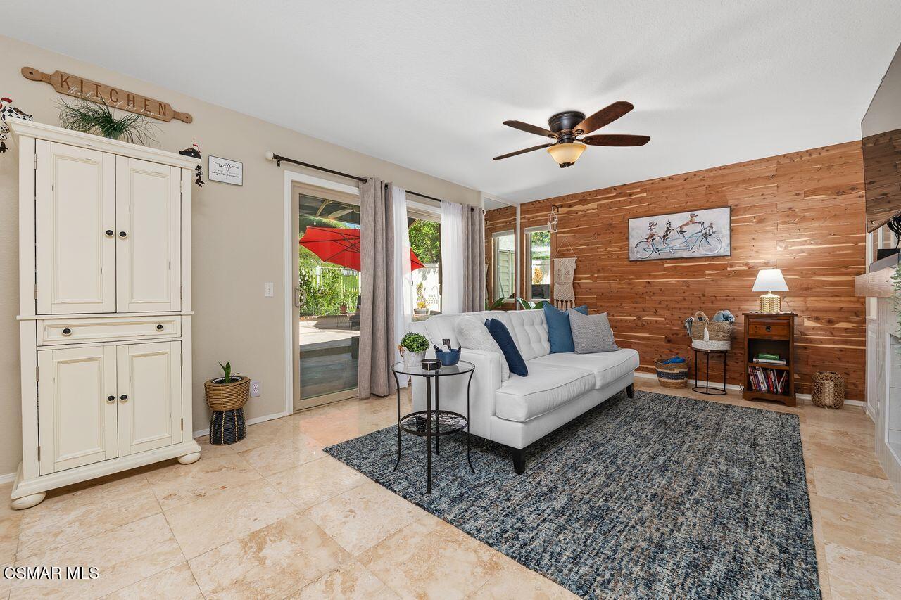 885 Congressional Road Simi Valley, CA 93065 - Photo 14 of 44 a living room with furniture ceiling fan and a rug