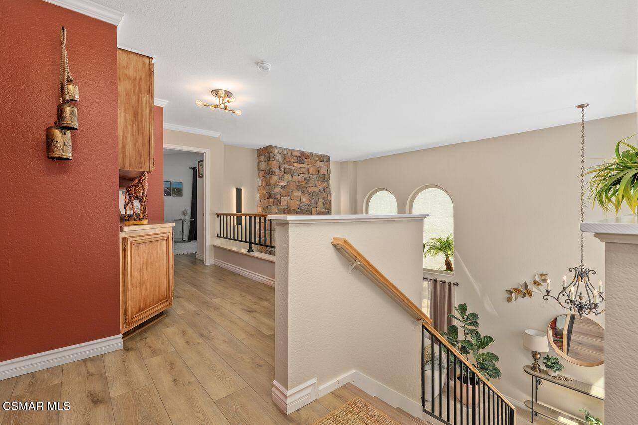 885 Congressional Road Simi Valley, CA 93065 - Photo 25 of 44 a view of a kitchen with furniture and wooden floor