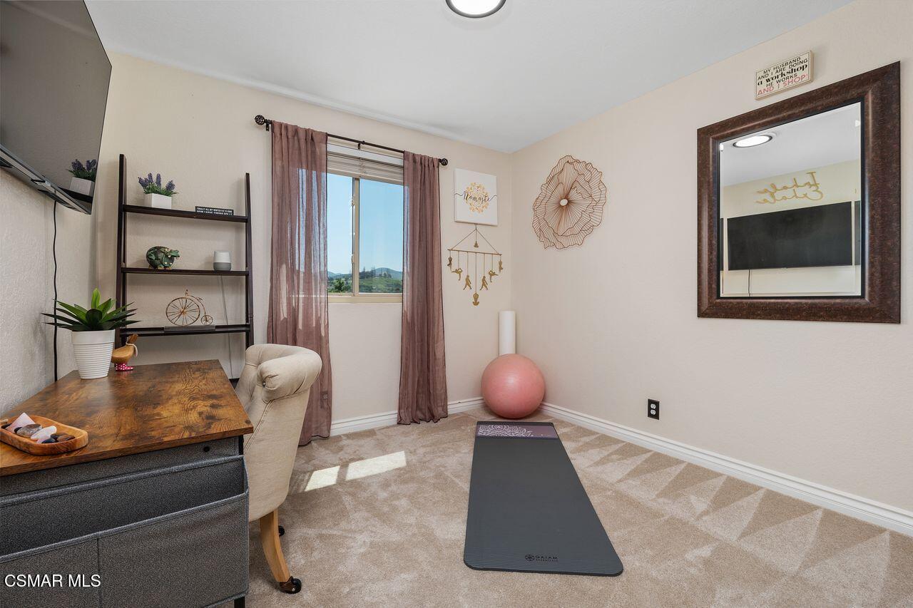 885 Congressional Road Simi Valley, CA 93065 - Photo 28 of 44 a living room with furniture and a large window