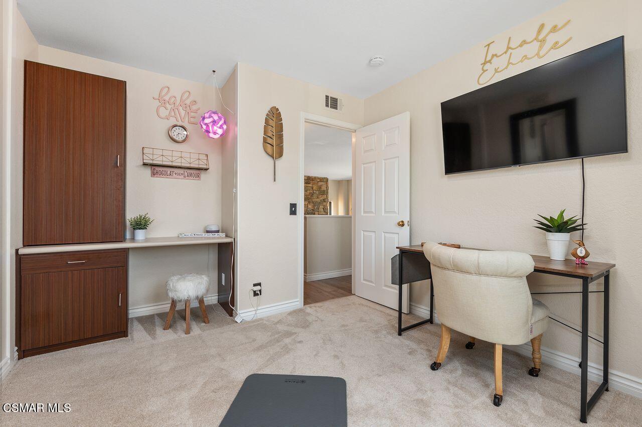 885 Congressional Road Simi Valley, CA 93065 - Photo 29 of 44 a living room with furniture and a flat screen tv