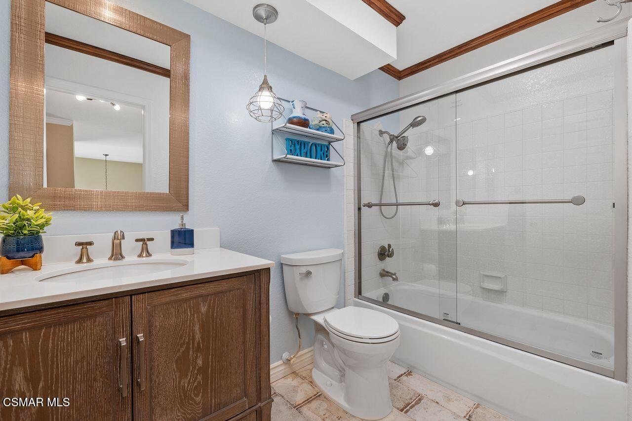 885 Congressional Road Simi Valley, CA 93065 - Photo 30 of 44 a bathroom with a sink a toilet and shower