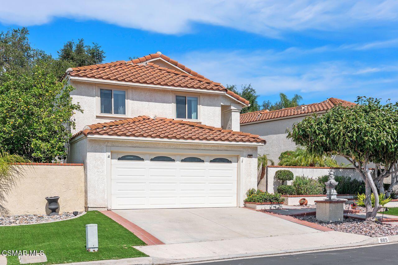 885 Congressional Road Simi Valley, CA 93065 - Photo 3 of 44 a front view of a house with a garden and plants