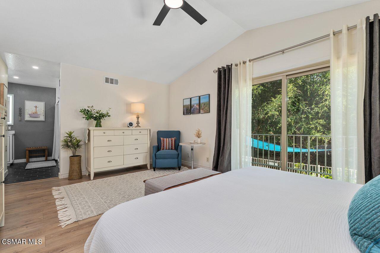 885 Congressional Road Simi Valley, CA 93065 - Photo 32 of 44 a bedroom with a bed and a large window