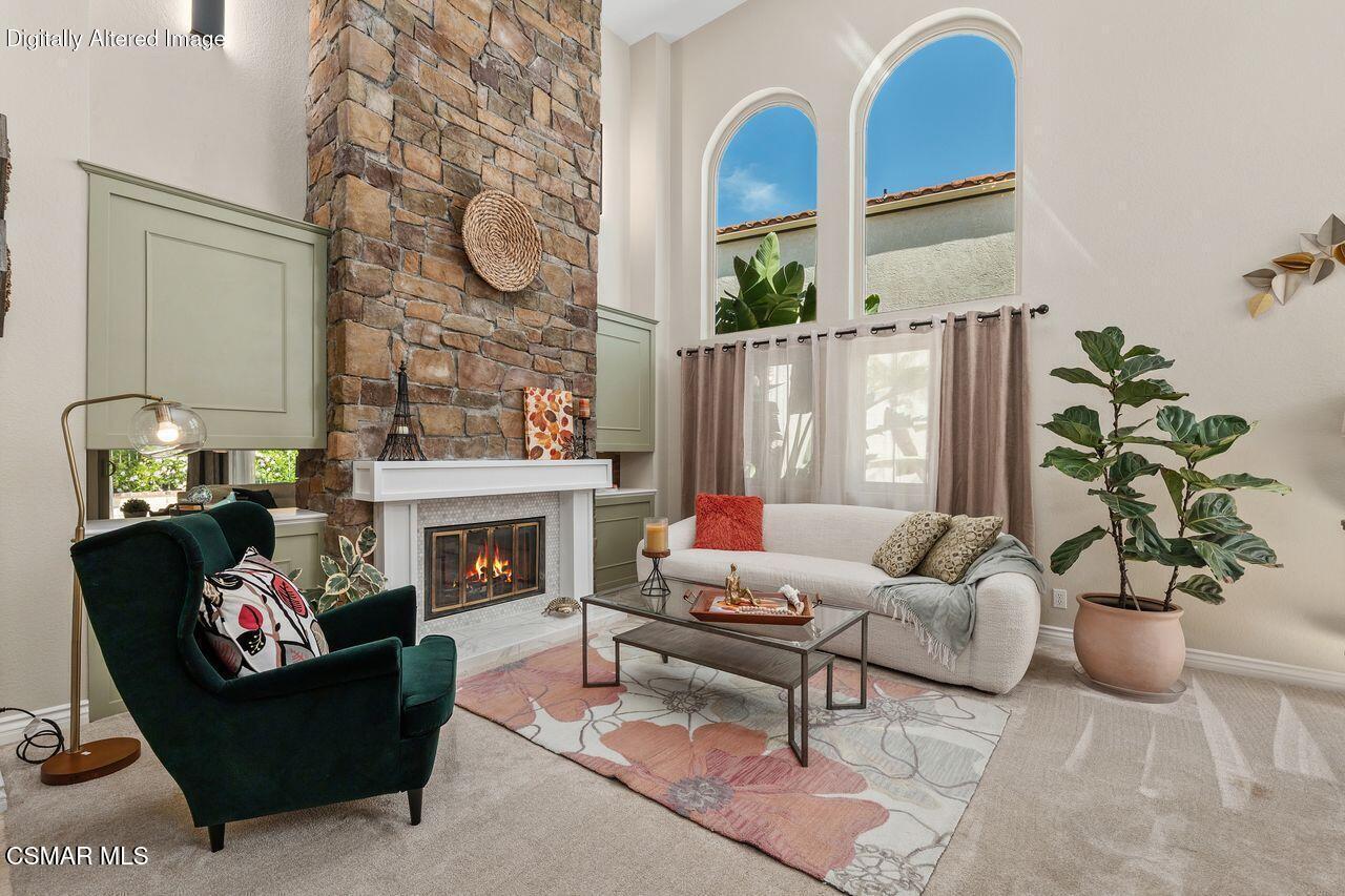885 Congressional Road Simi Valley, CA 93065 - Photo 10 of 44 a living room with furniture potted plant and a fireplace