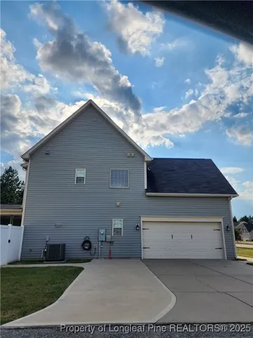 a house view with a garden space
