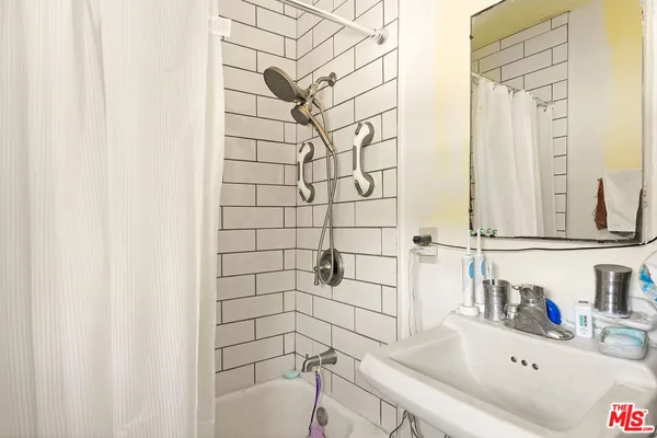 a bathroom with a sink and a bathtub