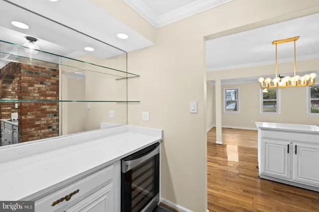 a kitchen with a refrigerator sink and stove