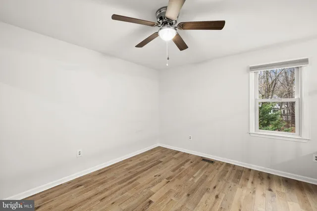 a view of a wooden deck and a lake view
