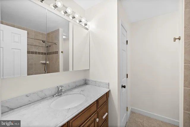 view of a house with a yard and sitting area