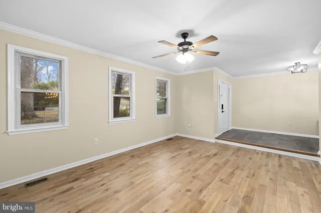 a kitchen with a sink and refrigerator