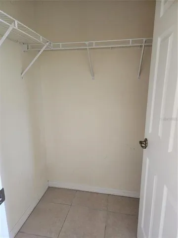 a view of an empty walk in closet