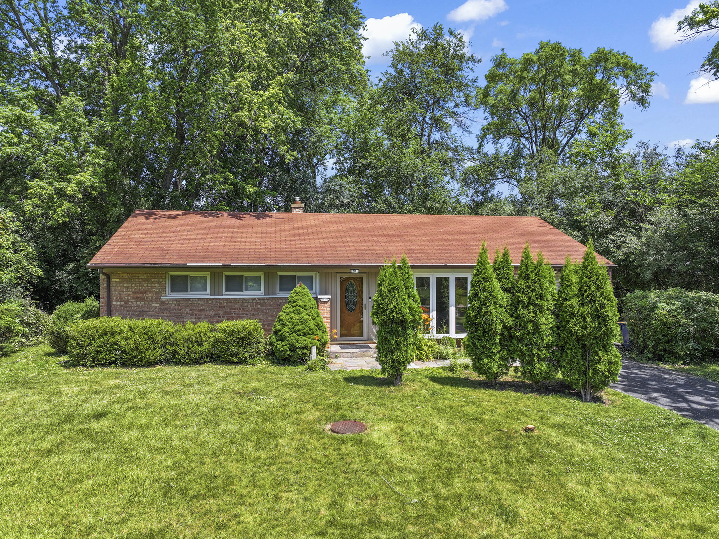 1121 Whitfield Road Northbrook, IL 60062 - Photo 1 of 34 a view of a house with garden and yard