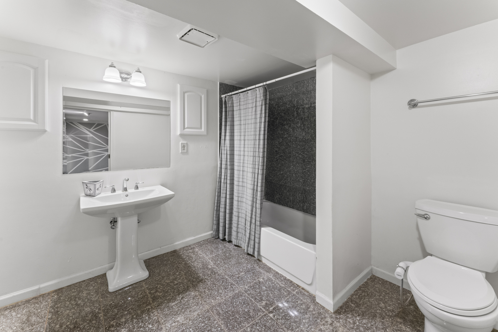 1121 Whitfield Road Northbrook, IL 60062 - Photo 23 of 34 a bathroom with a sink mirror toilet and shower