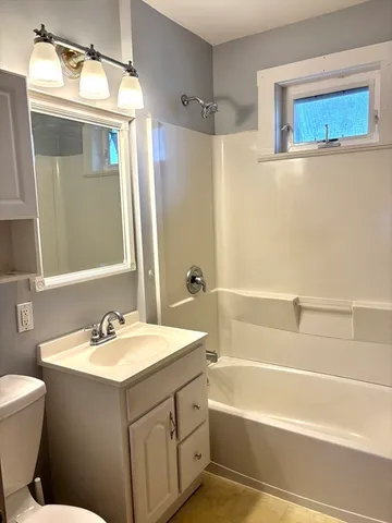 a view of a large building from a balcony