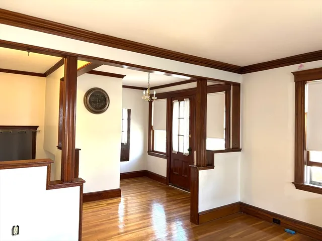 view of hall with wooden floor