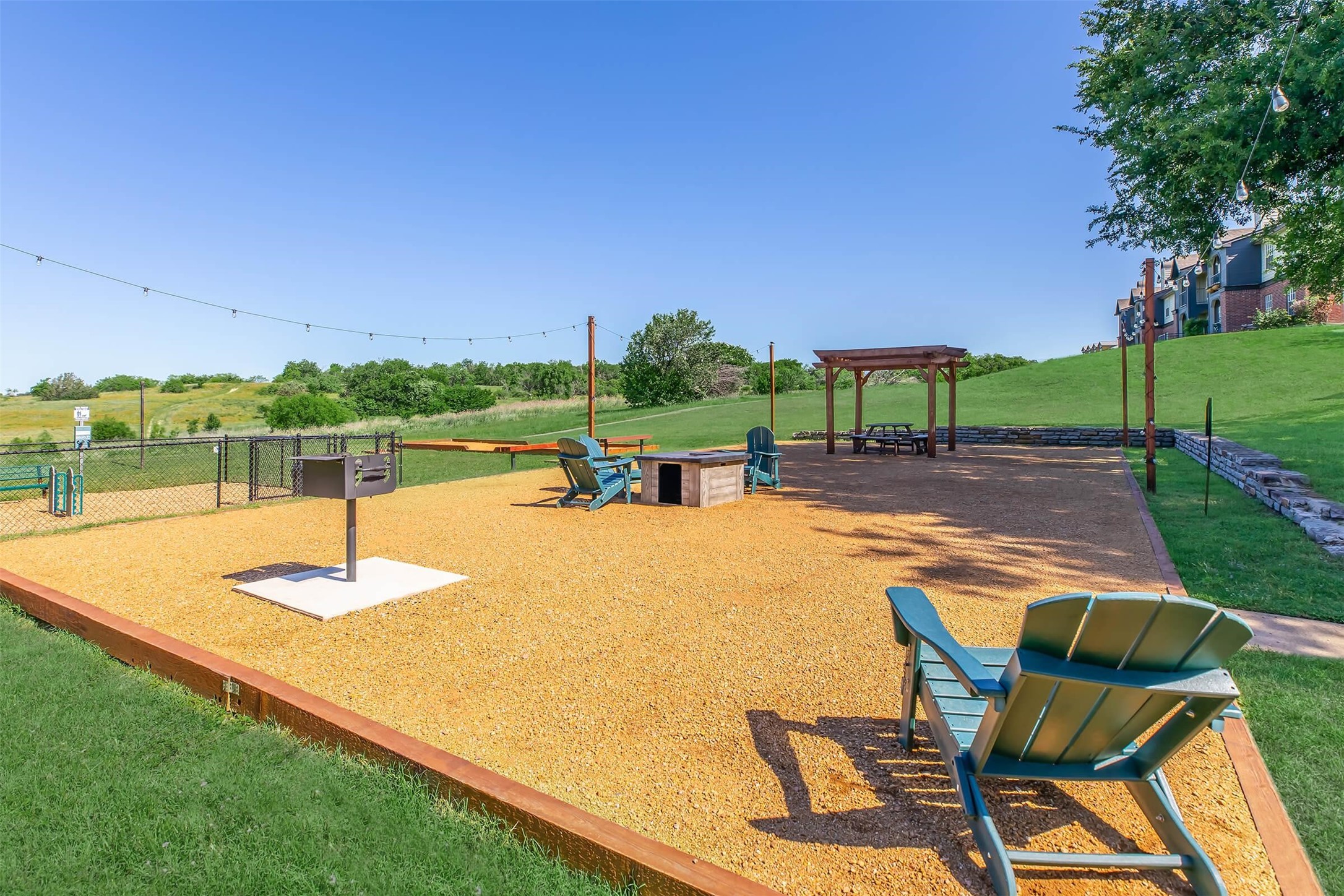 8301 Boat Club Road, Unit 1012 Fort Worth, TX 76179 - Photo 27 of 42 a swimming pool with outdoor seating and yard