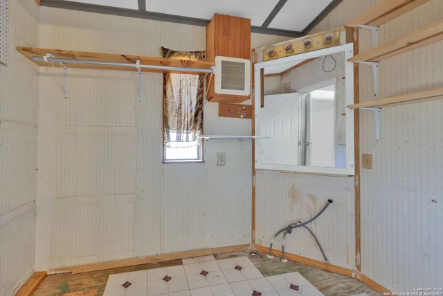 a view of walk in closet