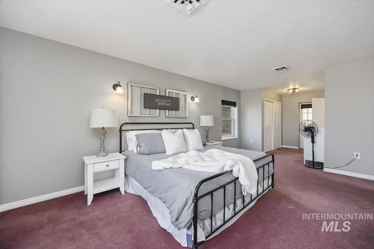 899 East 500th Street South Declo, ID 83323 - Photo 26 of 50 Bedroom with carpet flooring and a closet