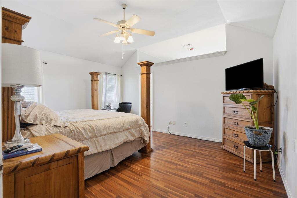 1970 Farm To Market Road 2264 Decatur, TX 76234 - Photo 15 of 27 a bedroom with a bed and a flat screen tv