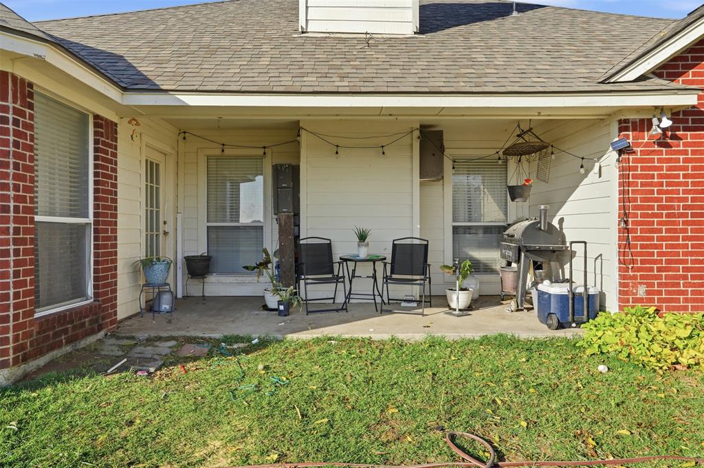 1970 Farm To Market Road 2264 Decatur, TX 76234 - Photo 21 of 27 a view of backyard with outdoor seating and plants