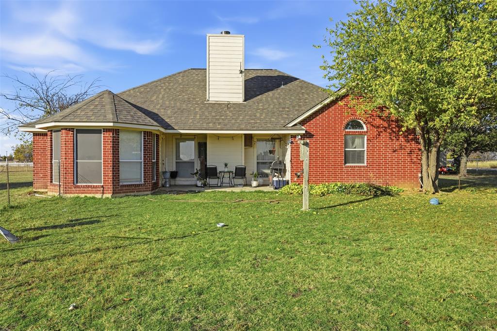 1970 Farm To Market Road 2264 Decatur, TX 76234 - Photo 22 of 27 a front view of house with yard and trees