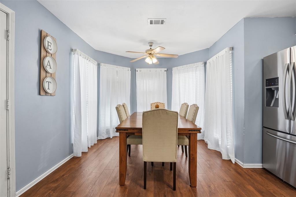 1970 Farm To Market Road 2264 Decatur, TX 76234 - Photo 7 of 27 a view of a a dining room with furniture window and wooden floor