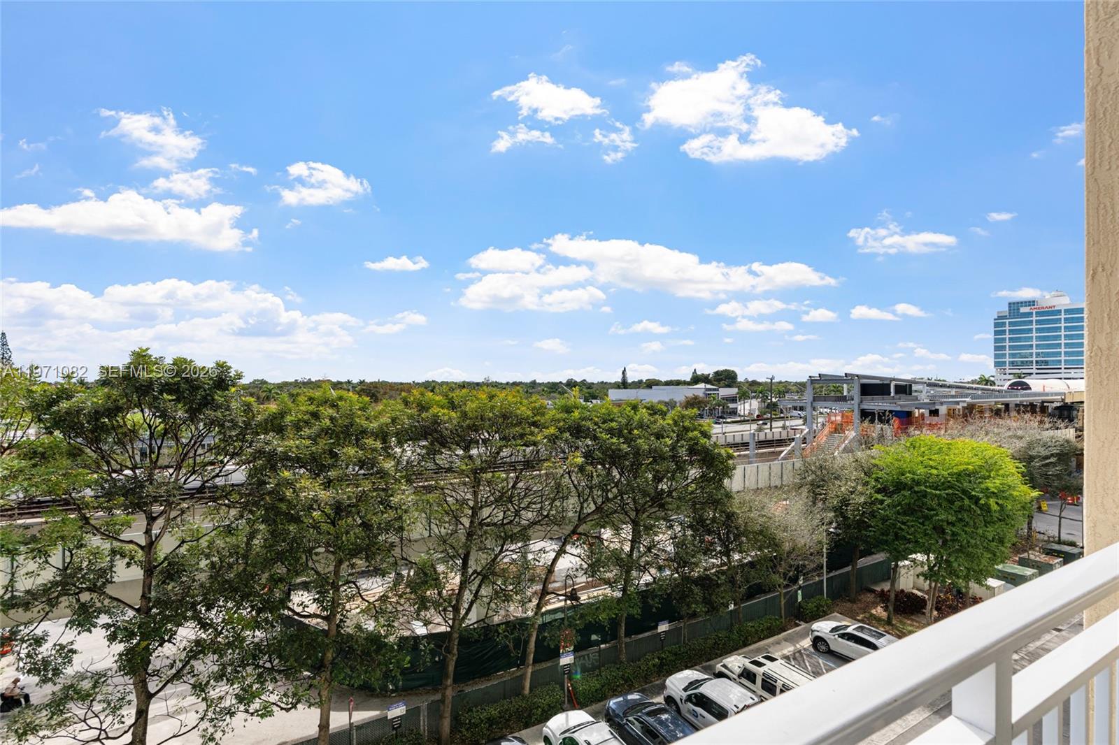 7275 Southwest 90th Way, Unit 404 Miami, FL 33156 - Photo 23 of 35 a view of a city with tall buildings