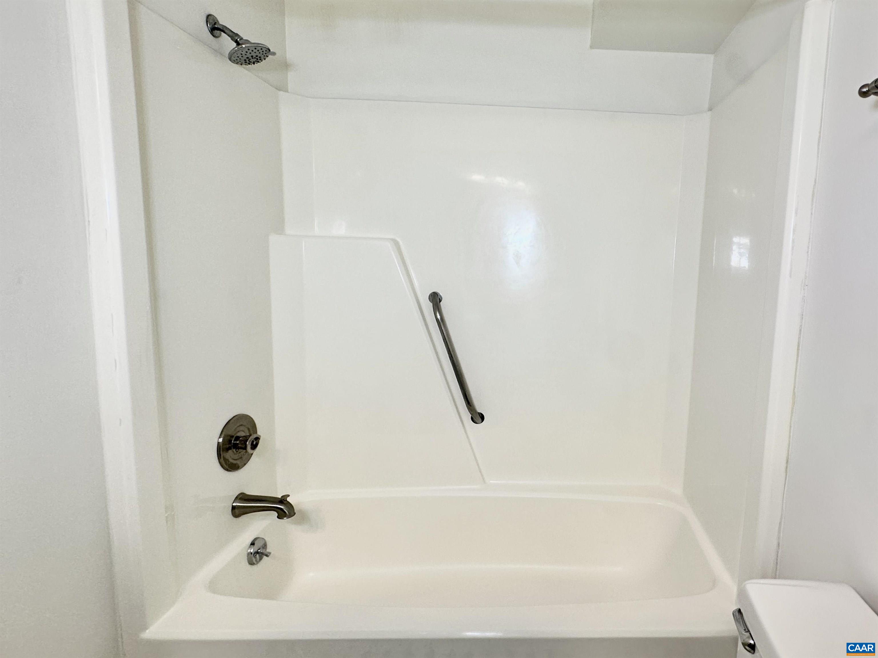 104 Turtle Creek Road, Unit 9 Charlottesville, VA 22901 - Photo 16 of 23 a bathroom with a bathtub
