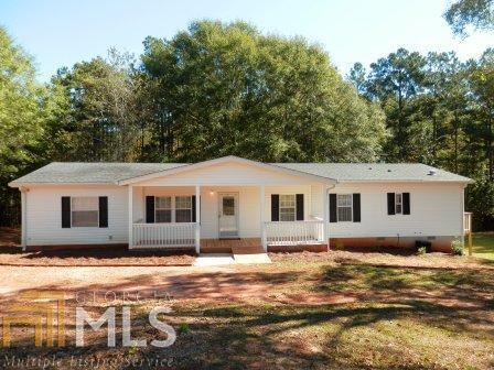 427 Boxankle Road, Unit 7 Forsyth, GA 31029 - Photo 1 of 1 a view of a house with a yard