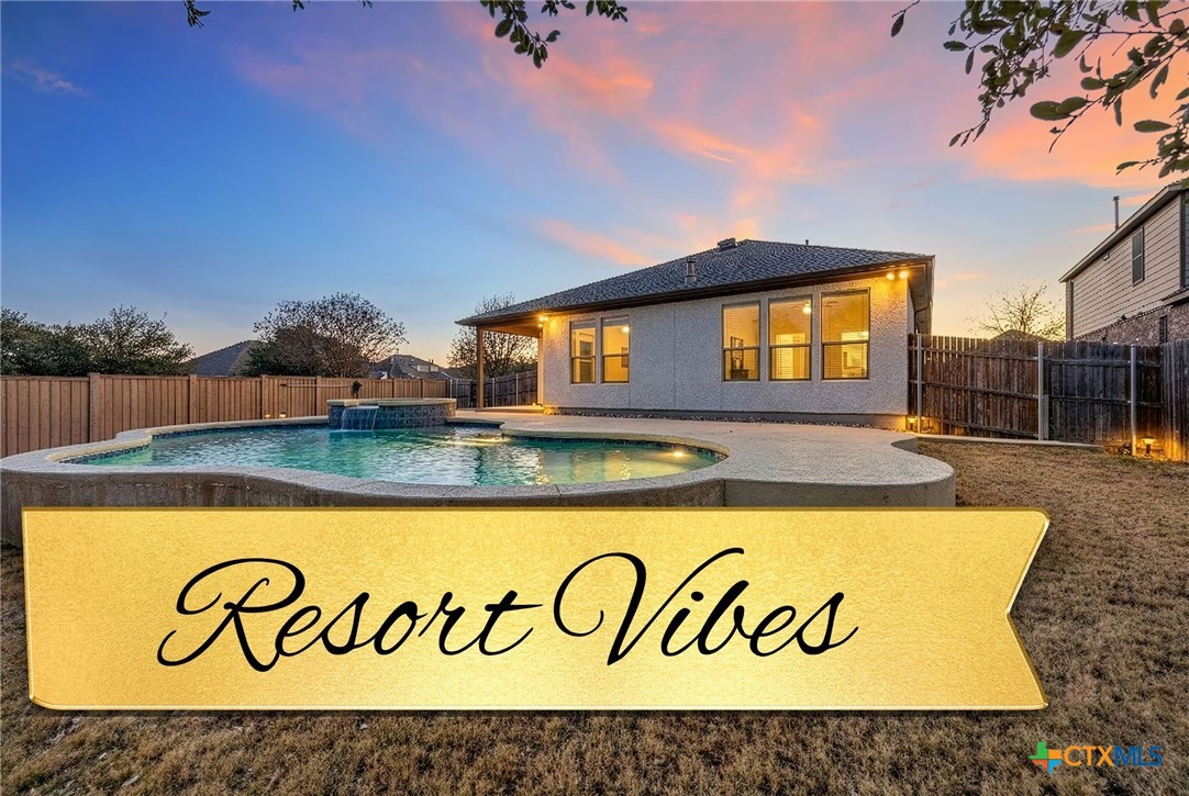 a view of outdoor space with signage and flags