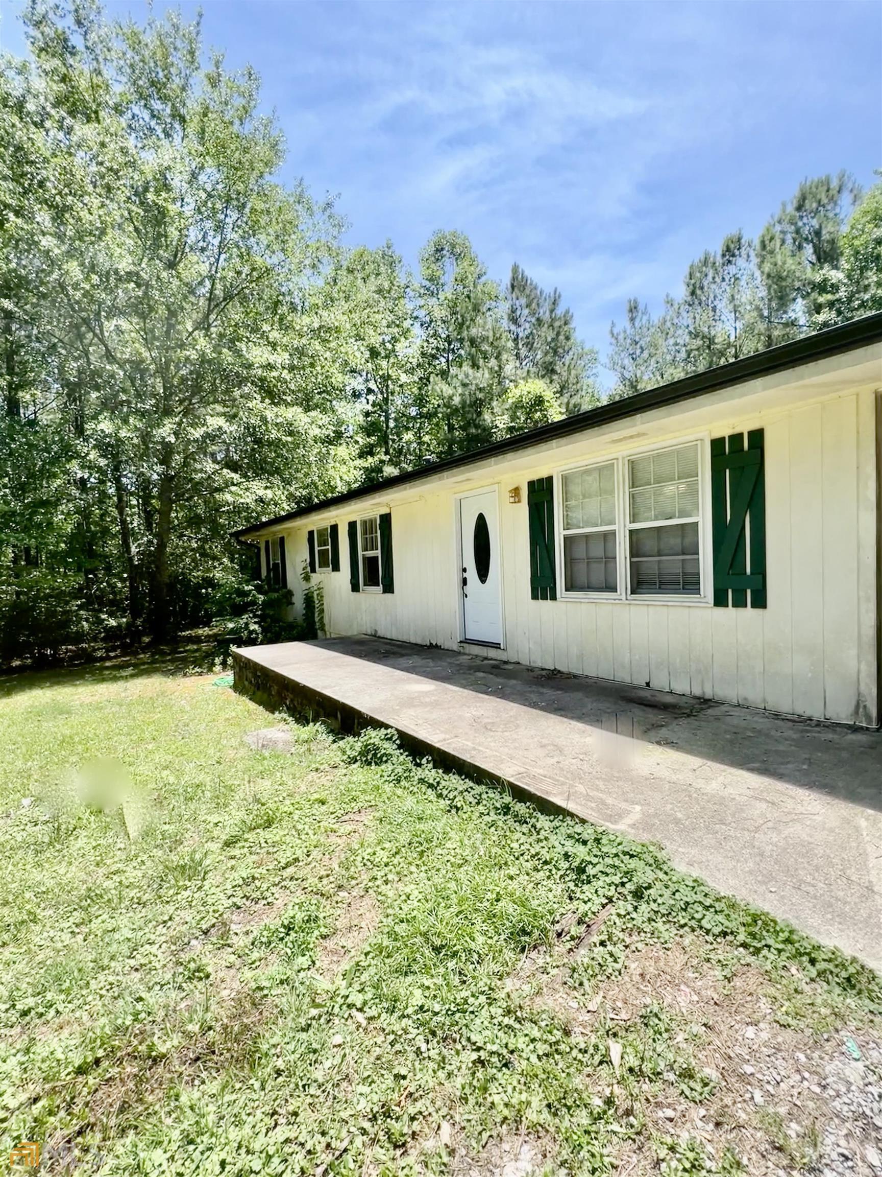 177 East Ranchette Road Temple, GA 30179 - Photo 1 of 1 a view of a house with a yard