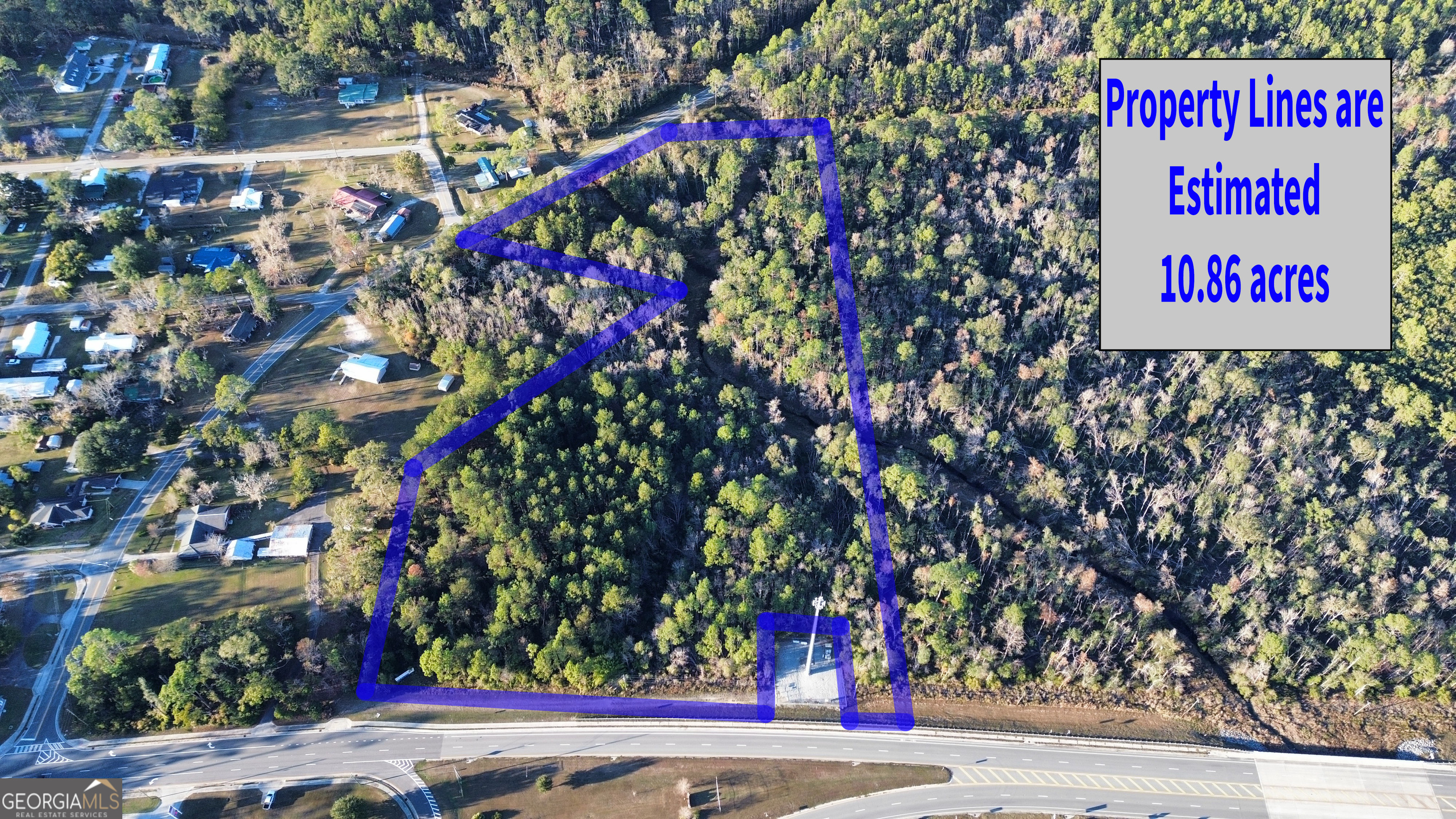 0 Waycross Highway Homerville, GA 31634 - Photo 2 of 2 a sign that is sitting in front of flowers