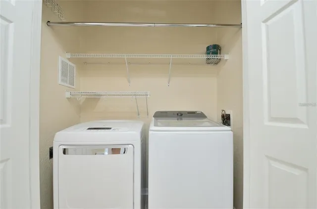 a utility room with dryer and washer