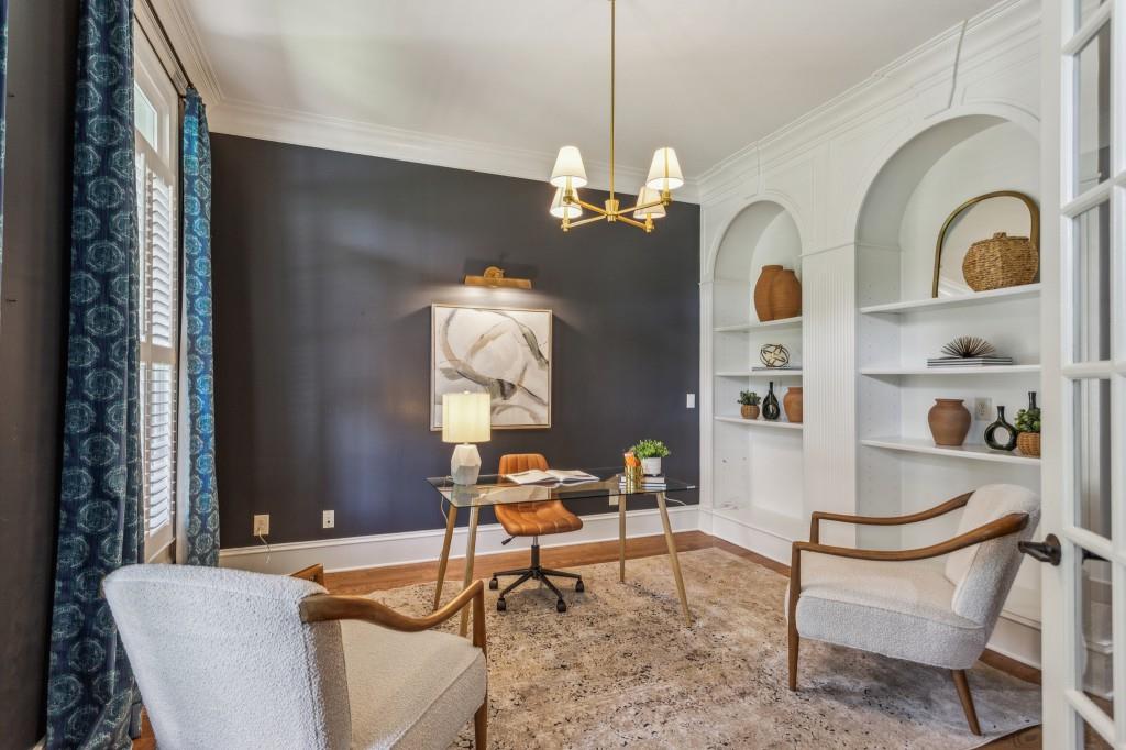 1363 Sylvan Circle Northeast Brookhaven, GA 30319 - Photo 15 of 56 a living room with furniture and a chandelier