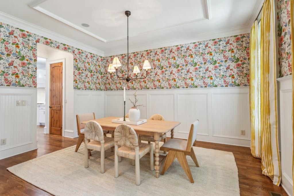 1363 Sylvan Circle Northeast Brookhaven, GA 30319 - Photo 19 of 56 a view of a dining room with furniture and wooden floor