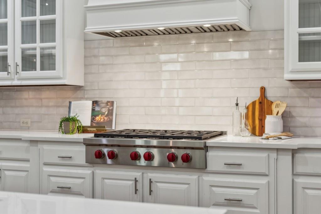 1363 Sylvan Circle Northeast Brookhaven, GA 30319 - Photo 24 of 56 a kitchen with a stove and cabinets
