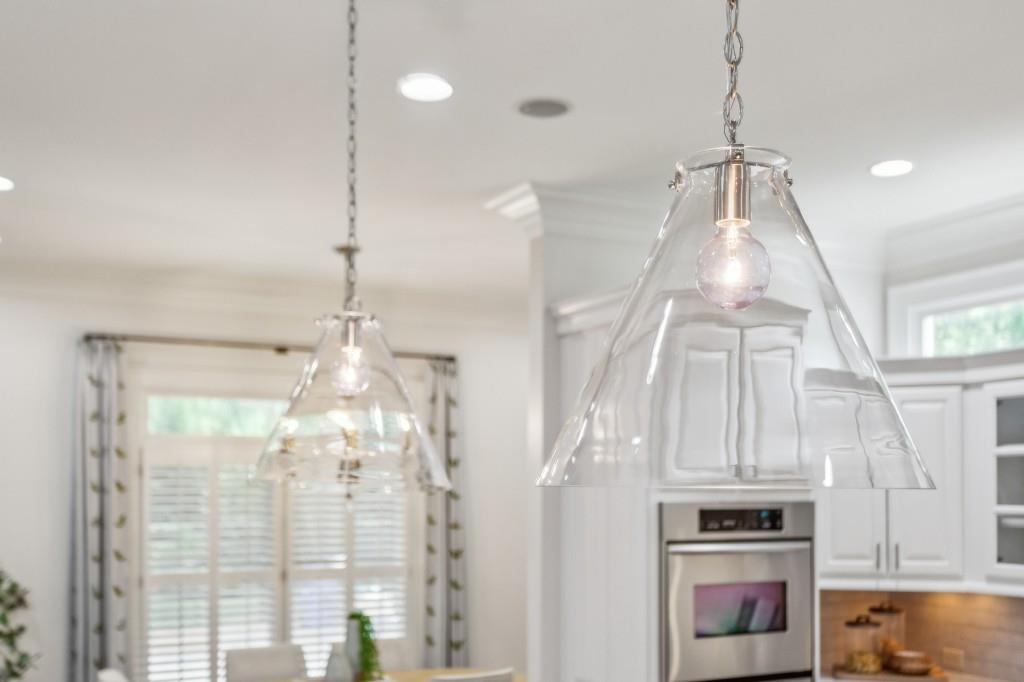1363 Sylvan Circle Northeast Brookhaven, GA 30319 - Photo 25 of 56 a kitchen with kitchen island a counter top space wooden floor and appliances