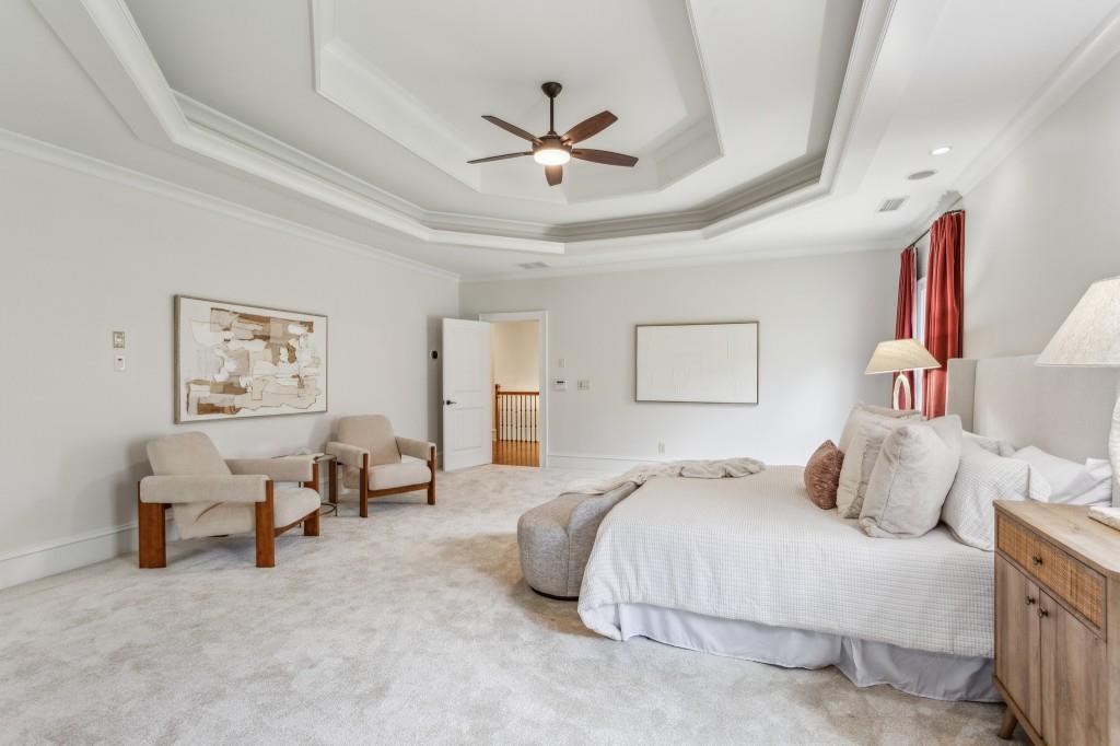 1363 Sylvan Circle Northeast Brookhaven, GA 30319 - Photo 33 of 56 a bedroom with a bed and white walls