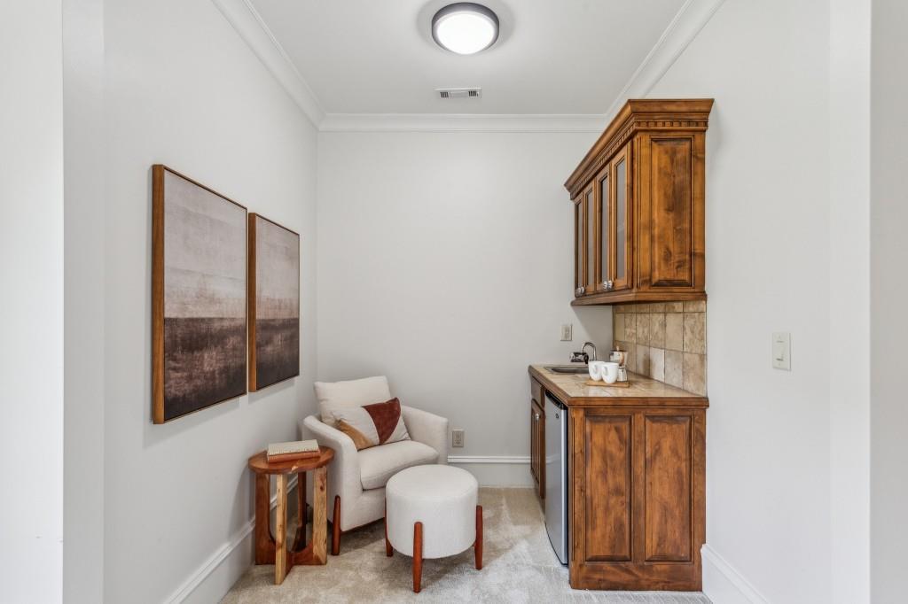 1363 Sylvan Circle Northeast Brookhaven, GA 30319 - Photo 34 of 56 a bathroom with a toilet sink and mirror