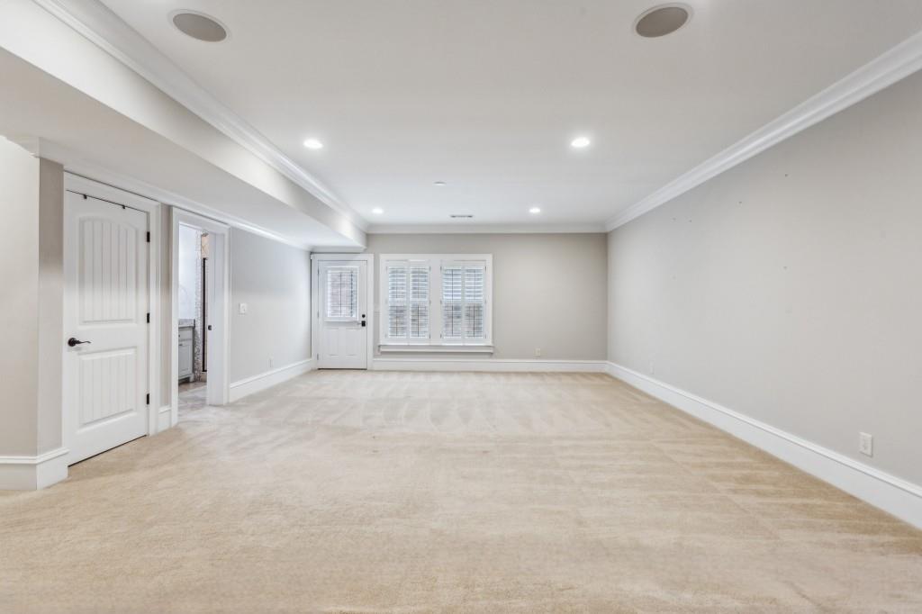 1363 Sylvan Circle Northeast Brookhaven, GA 30319 - Photo 47 of 56 an empty room with a empty space and windows
