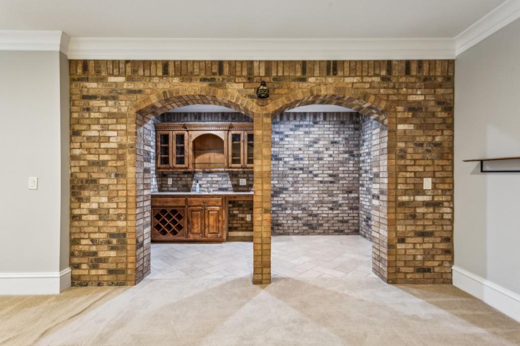 1363 Sylvan Circle Northeast Brookhaven, GA 30319 - Photo 49 of 56 a view of entryway with brick wall
