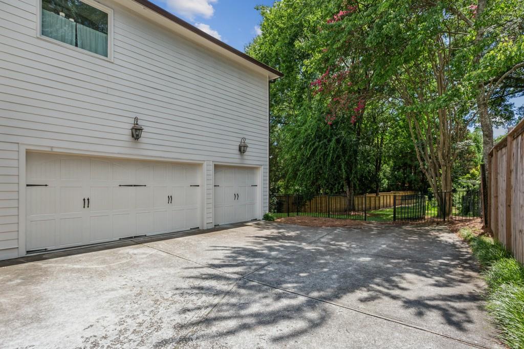 1363 Sylvan Circle Northeast Brookhaven, GA 30319 - Photo 55 of 56 a view of a house with a backyard