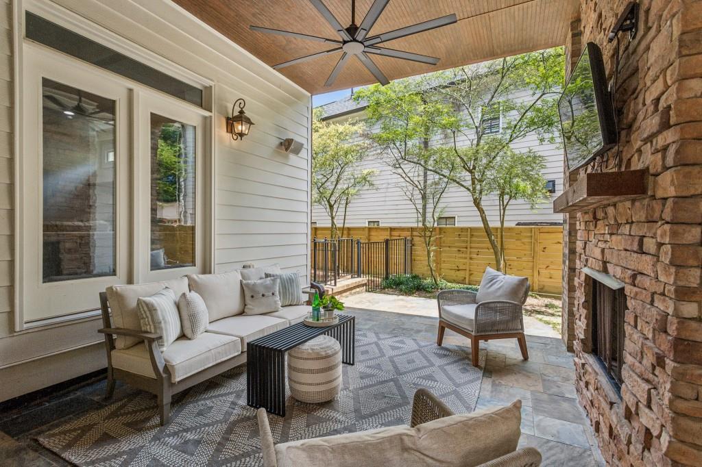 1363 Sylvan Circle Northeast Brookhaven, GA 30319 - Photo 6 of 56 a building outdoor space with patio furniture